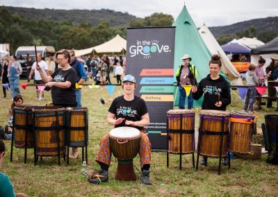 off grid living festival - people drumming
